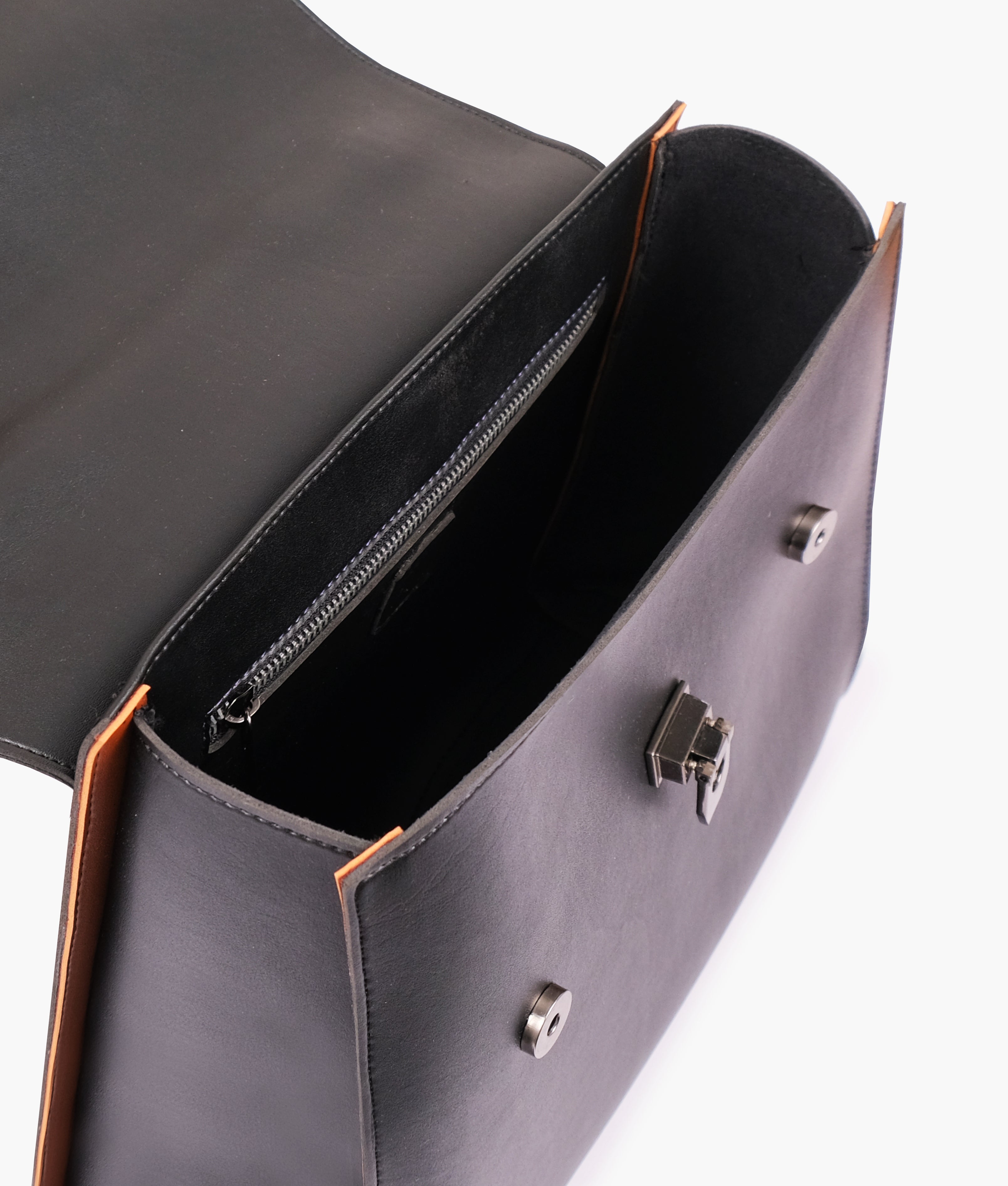 LumaVex - Black flap-over top-handle bag