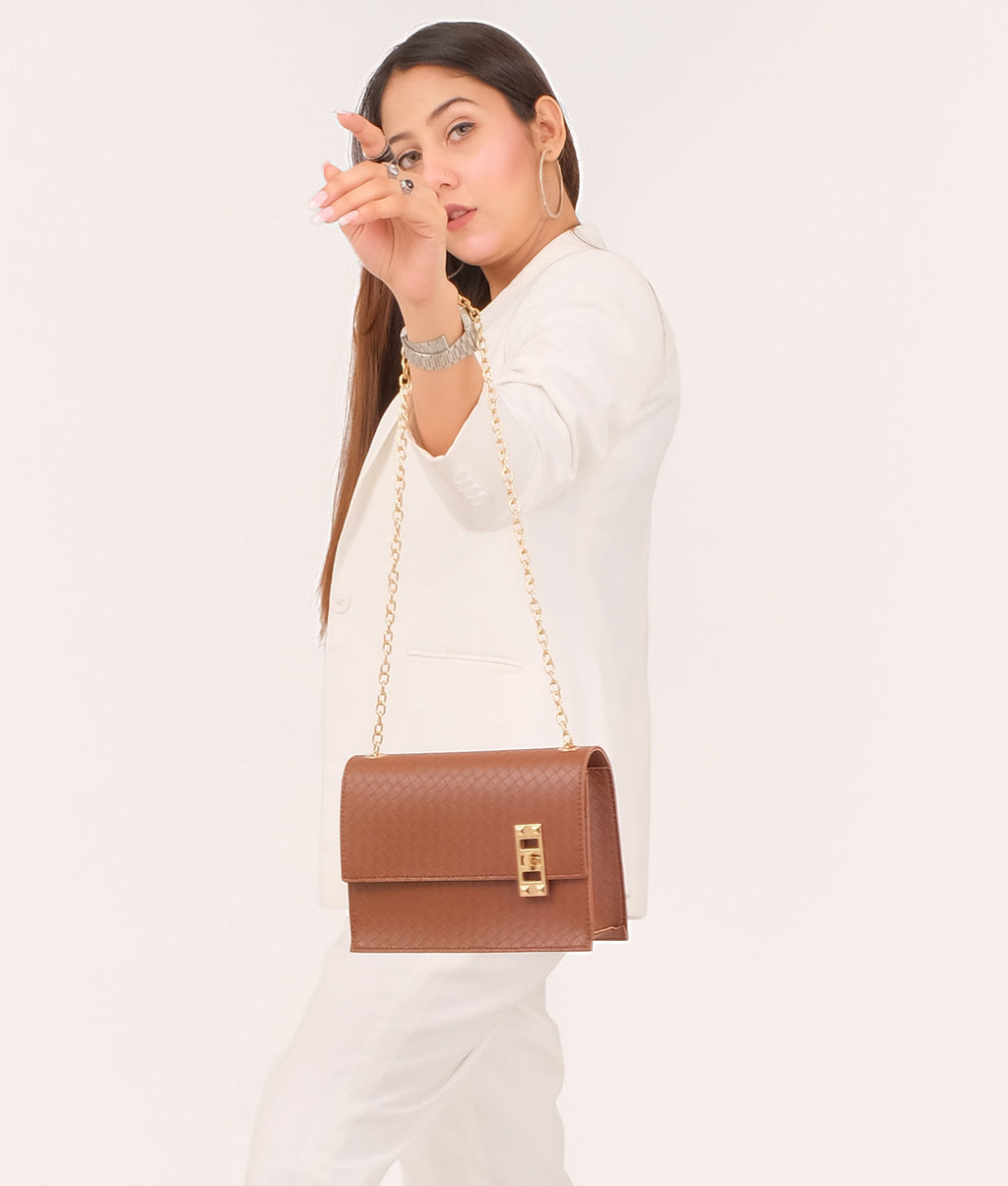 LumaVex - Brown weaved chain shoulder bag with twist lock