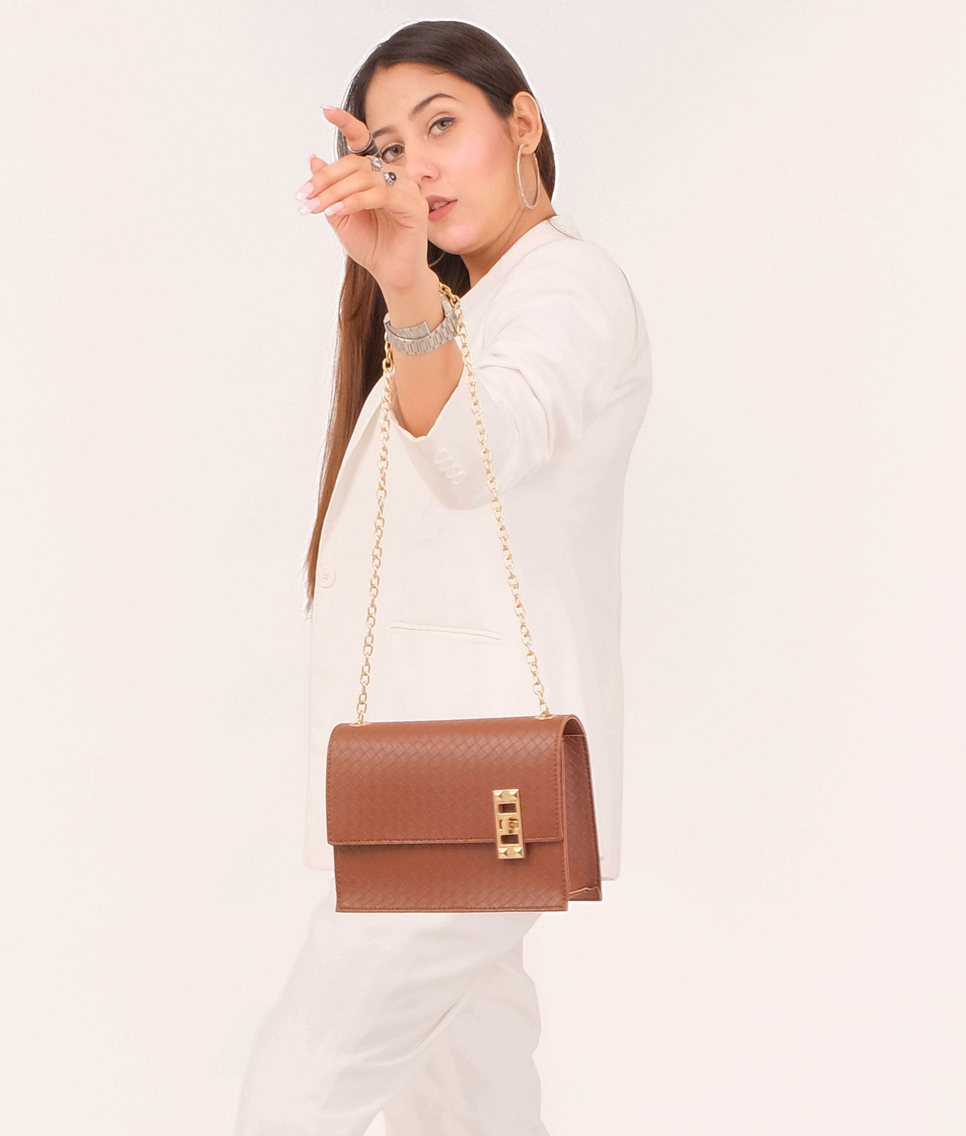 LumaVex - Brown weaved chain shoulder bag with twist lock