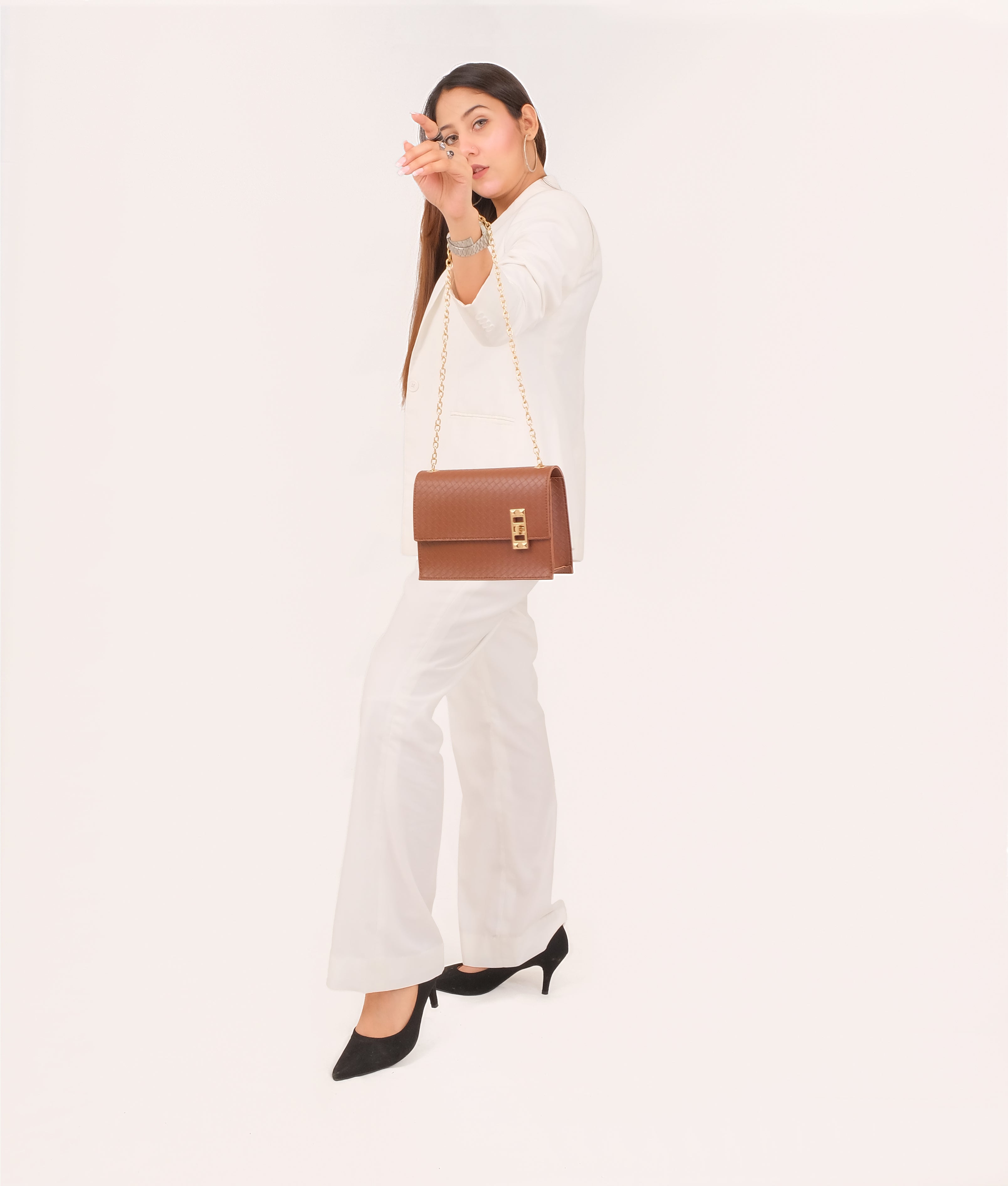 LumaVex - Brown weaved chain shoulder bag with twist lock